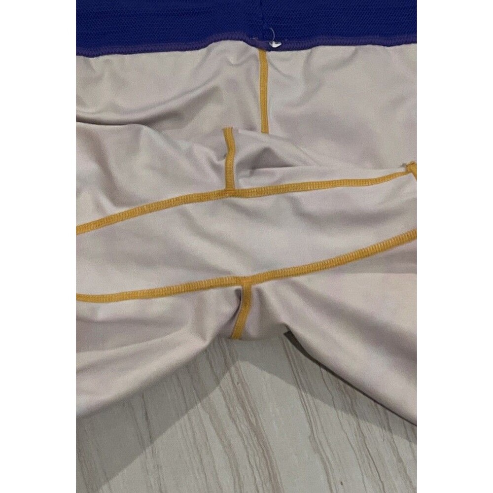Fabletics Perforated Run 2" Shorts 2-in-1 Design Cobalt Purple Orange Medium - Picture 8 of 11